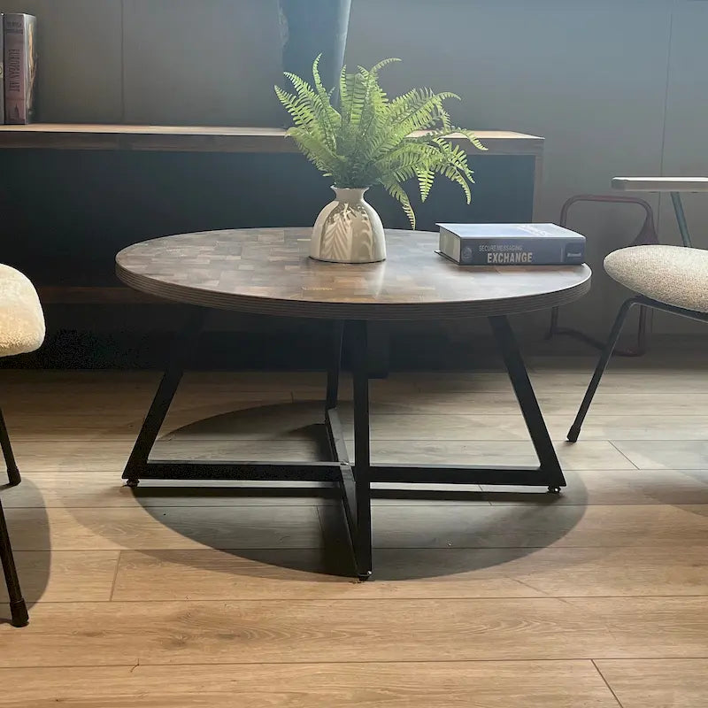 Table basse ronde noire et marron, piétement en X, 2 places
