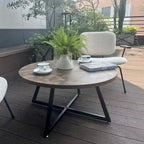 Table basse ronde noire et marron, piétement en X, 2 places