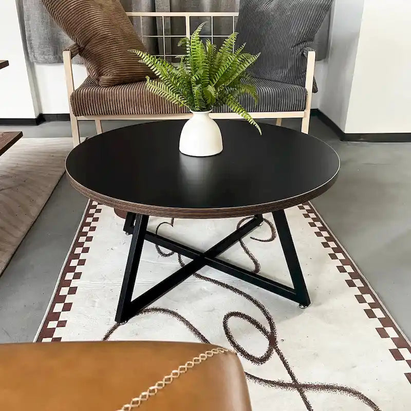 Table basse ronde noire et marron, piétement en X, 2 places