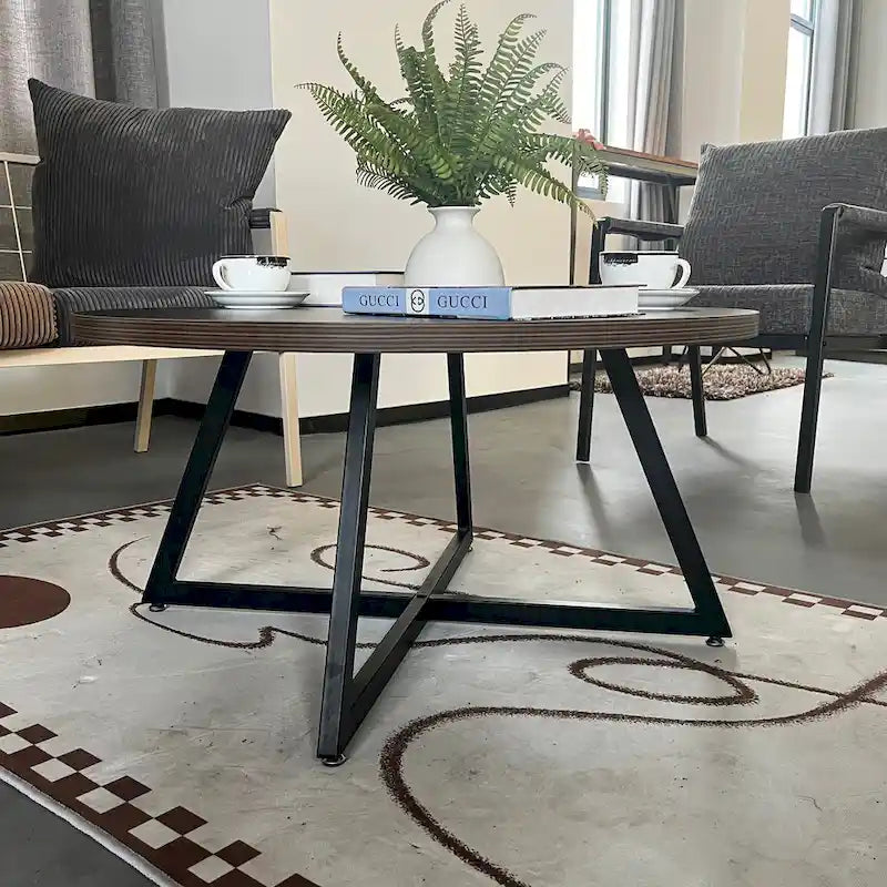 Table basse ronde noire et marron, piétement en X, 2 places