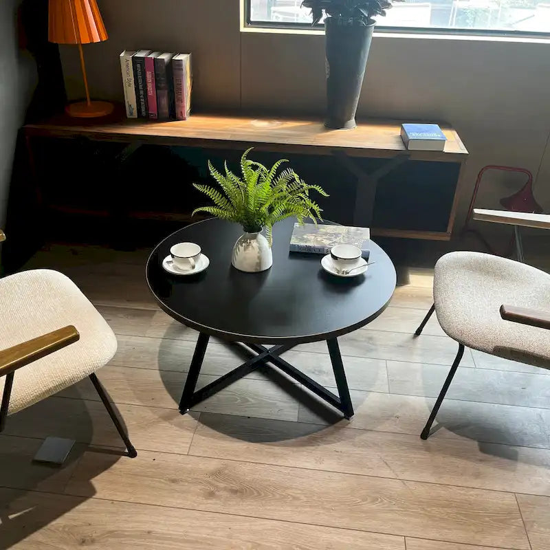 Table basse ronde noire et marron, piétement en X, 2 places