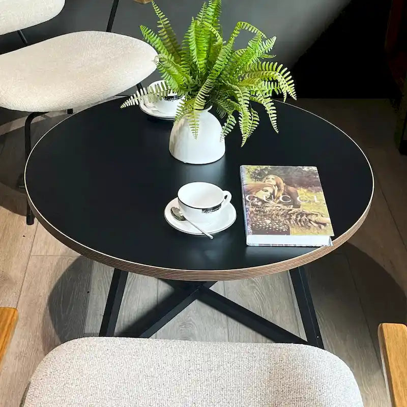 Table basse ronde noire et marron, piétement en X, 2 places