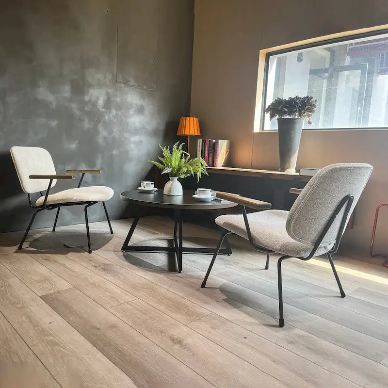 Table basse ronde noire et marron, piétement en X, 2 places
