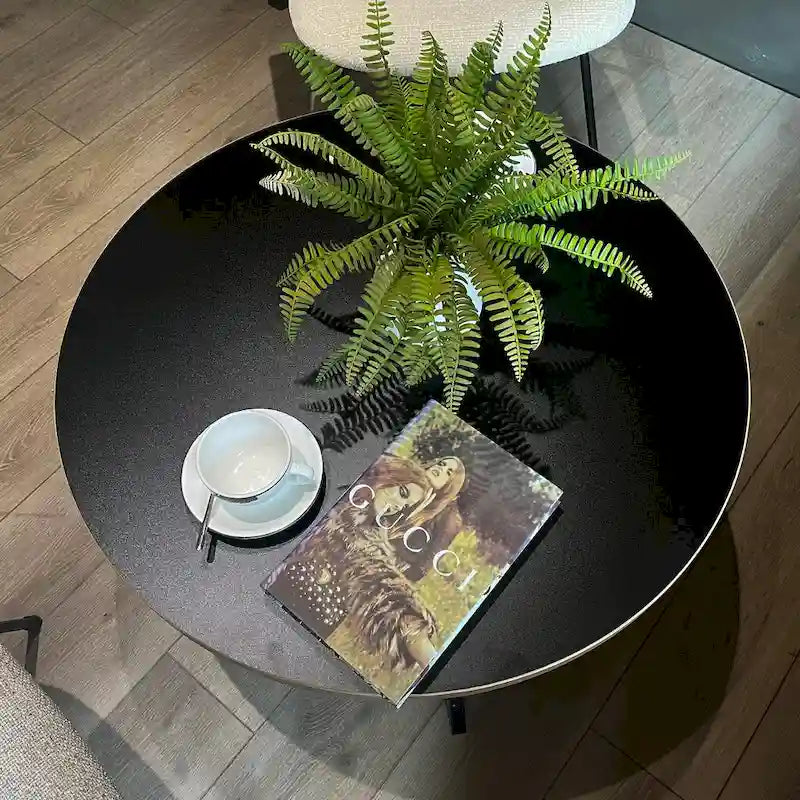 Table basse ronde noire et marron, piétement en X, 2 places