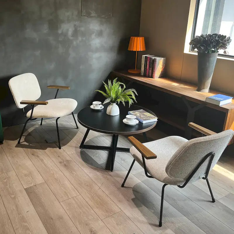 Table basse ronde noire et marron, piétement en X, 2 places