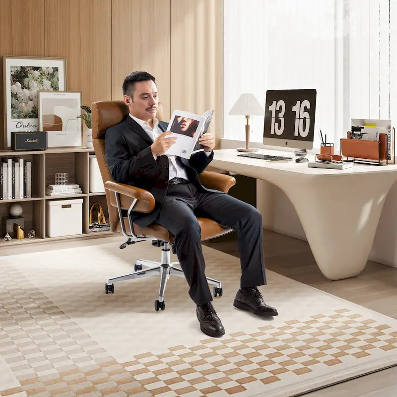 Chaise de bureau pivotante à dossier haut capitonnée couleur camel pour 1 personne