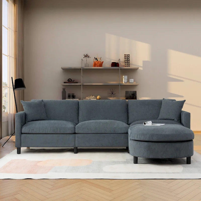 Canapé d'angle 4 places gris foncé avec pouf mobile et accoudoir de rangement