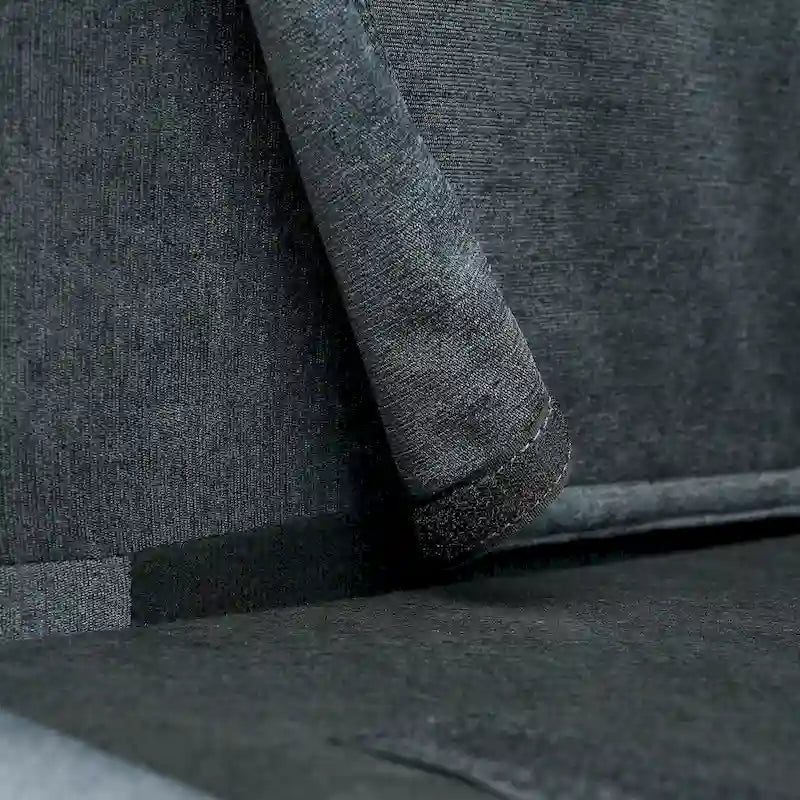 Canapé d'angle 4 places gris foncé avec pouf mobile et accoudoir de rangement