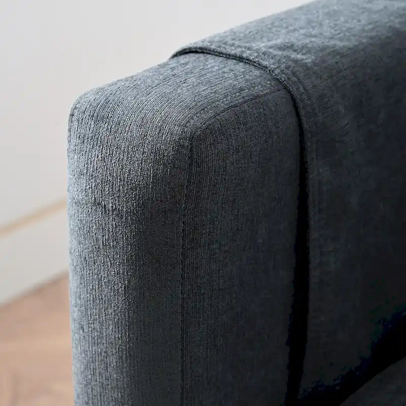 Canapé d'angle 4 places gris foncé avec pouf mobile et accoudoir de rangement